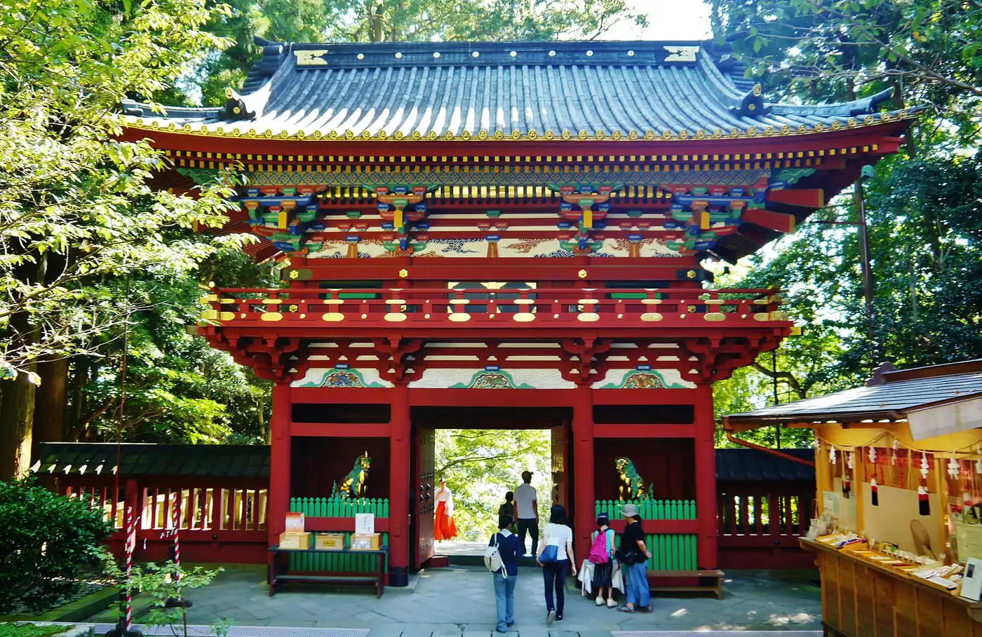 The vermilion gate of Kunozan Toshogu shrine, reached by ropeway from the Nihondaira plateau