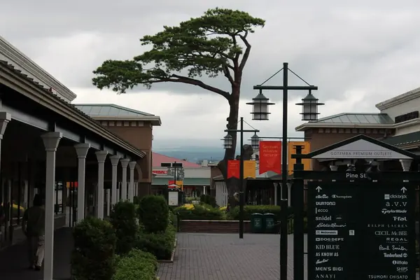 Covered walkways and shop signs at the outlets
