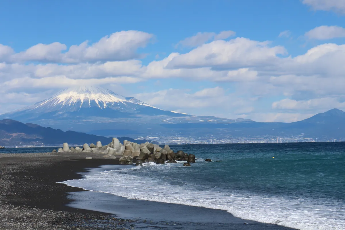 Snow-capped Mt. Fuji across Suruga Bay from the Miho shore