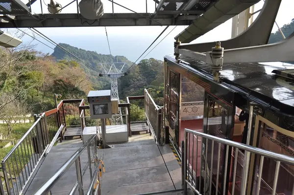 The ropeway car arriving at the platform