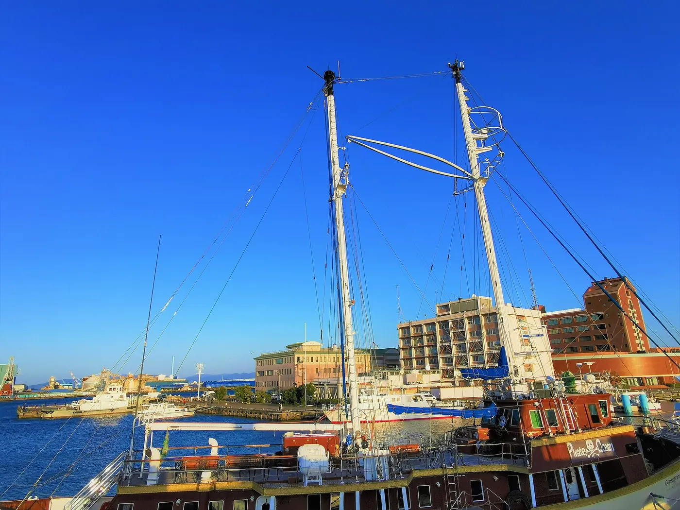 A tall ship moored at Hinode pier, seen from Marine Park